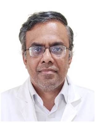 Dr. Kiran M